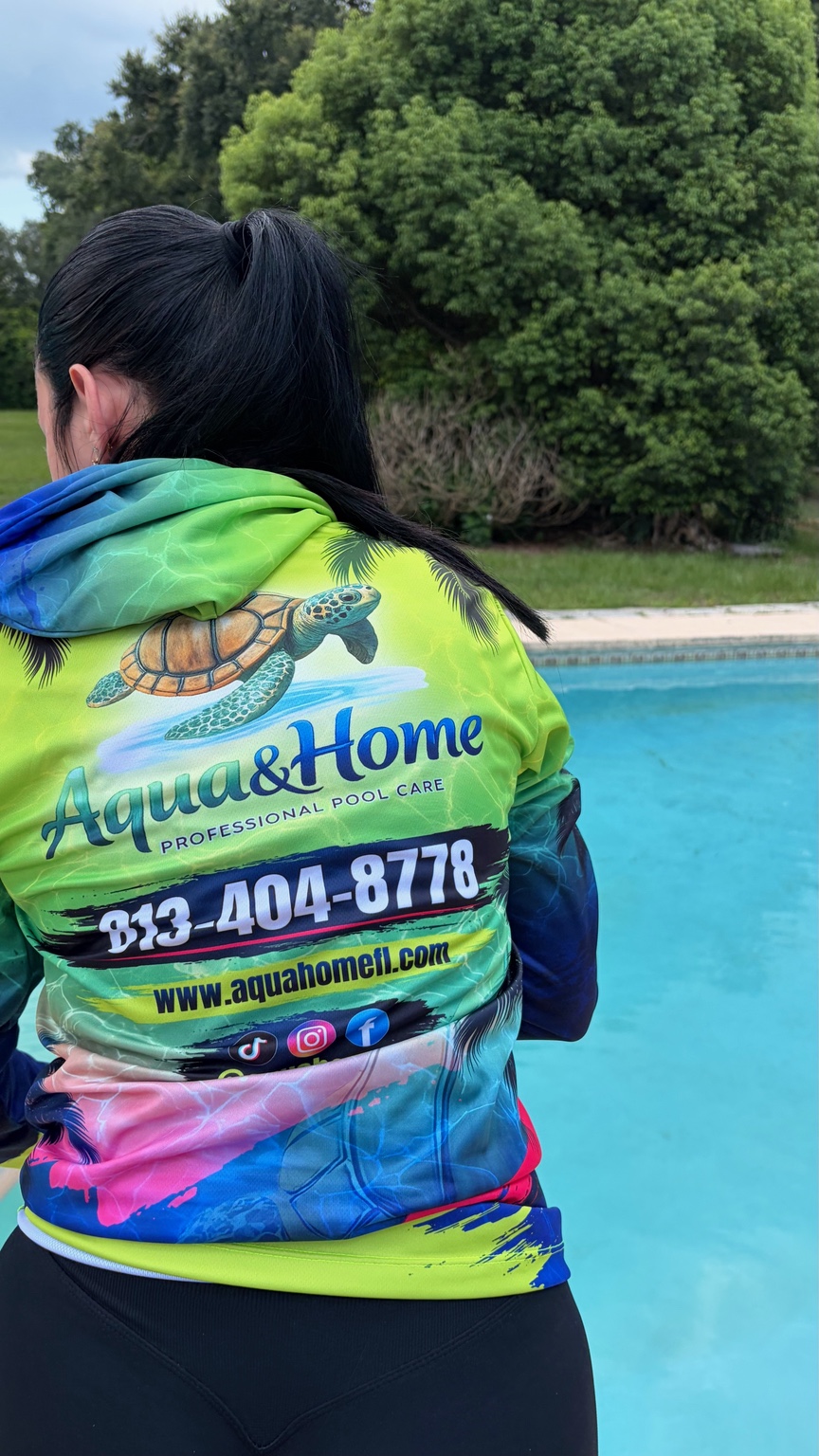 Aqua&Home team member beside a pool